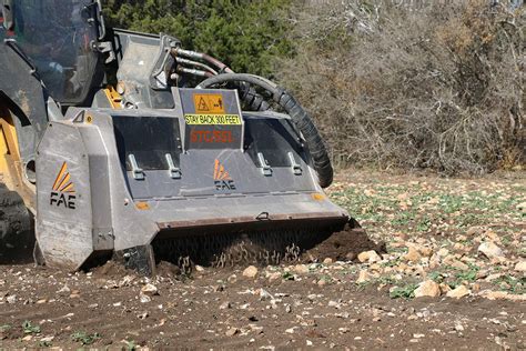 rock crusher for skid steer|rock crusher attachment for excavator.